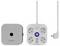 White multi-socket extension with four sockets and a switch, one of them occupied. Beside it a square adapter with a button in the centre.