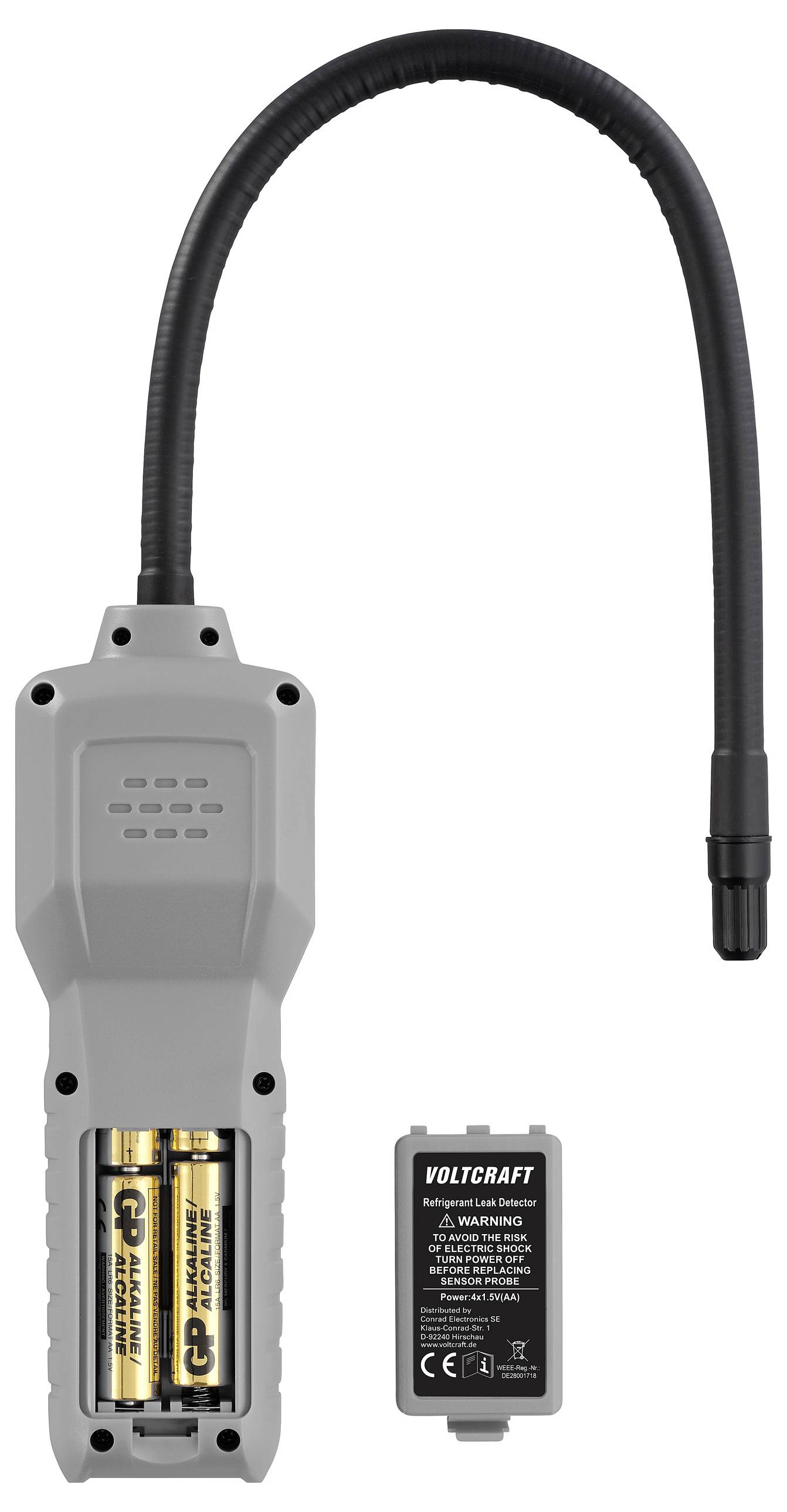 Voltcraft gas leak detector with flexible probe, compartment open revealing two AA batteries, and a detached battery cover.