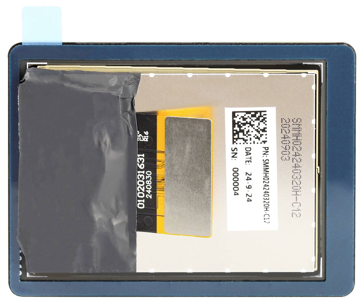 A covered electronic device with a visible barcode and serial number on a label in the centre.