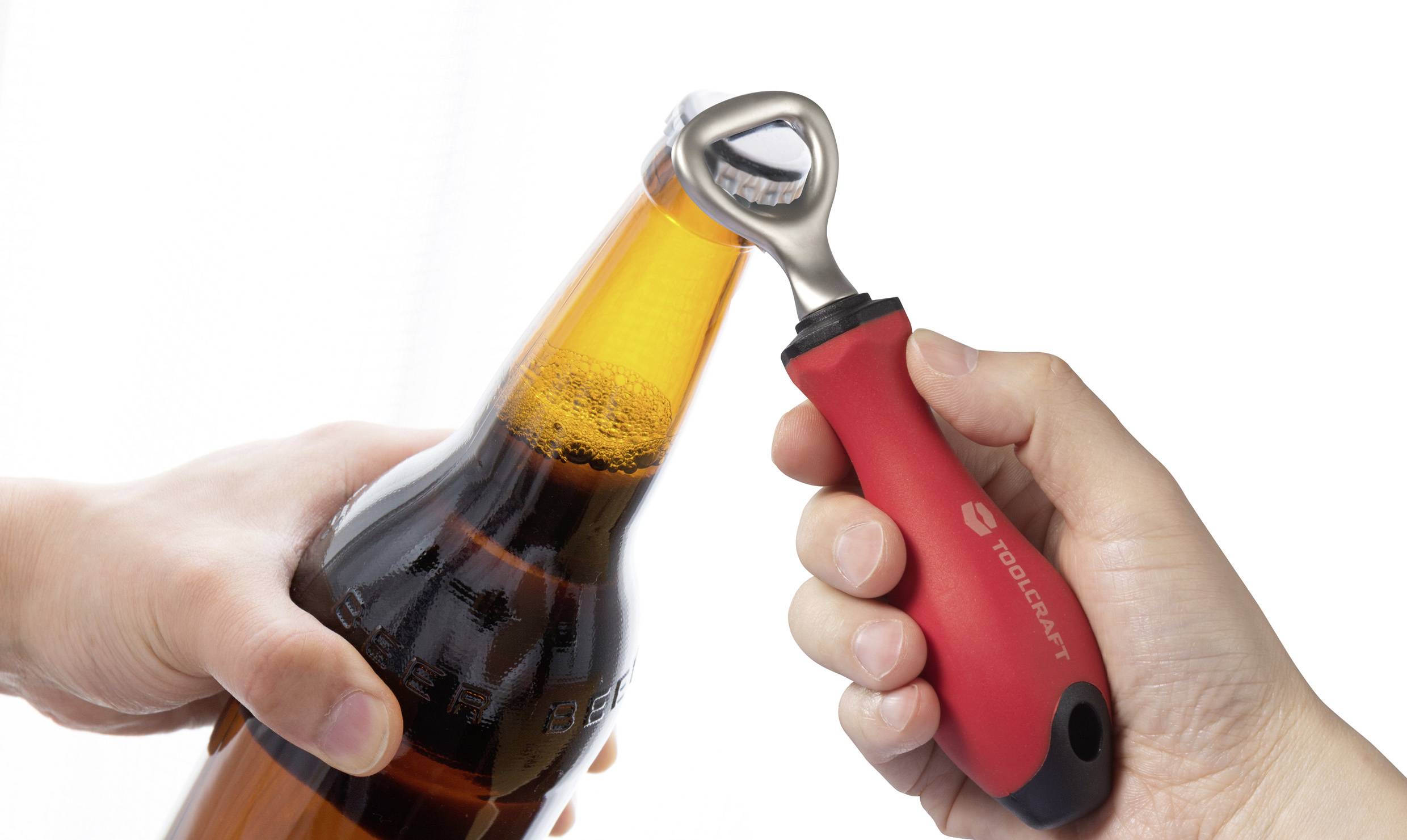 'A bottle being opened with a tool featuring a red, black-handled bottle opener, evoking a sense of readiness for a drink.'