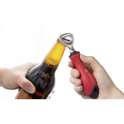 'A bottle being opened with a tool featuring a red, black-handled bottle opener, evoking a sense of readiness for a drink.'
