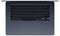 Laptop keyboard in a top-down view. Black design with QWERTZ layout. Trackpad visible beneath the keyboard.
