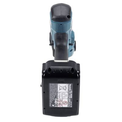 A cordless drill with a teal body and black handle is viewed from the rear, showing a rectangular battery pack with printed safety instructions.