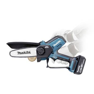 A person uses a Makita cordless mini chainsaw to cut a small branch, showcasing its compact design and ease of use for gardening tasks.