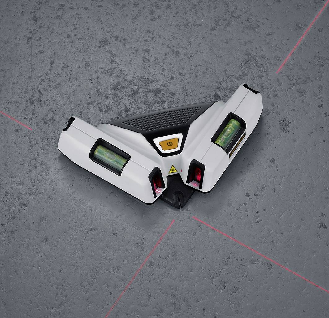 A triangular digital protractor on a grey background displays precise measurements using lasers.