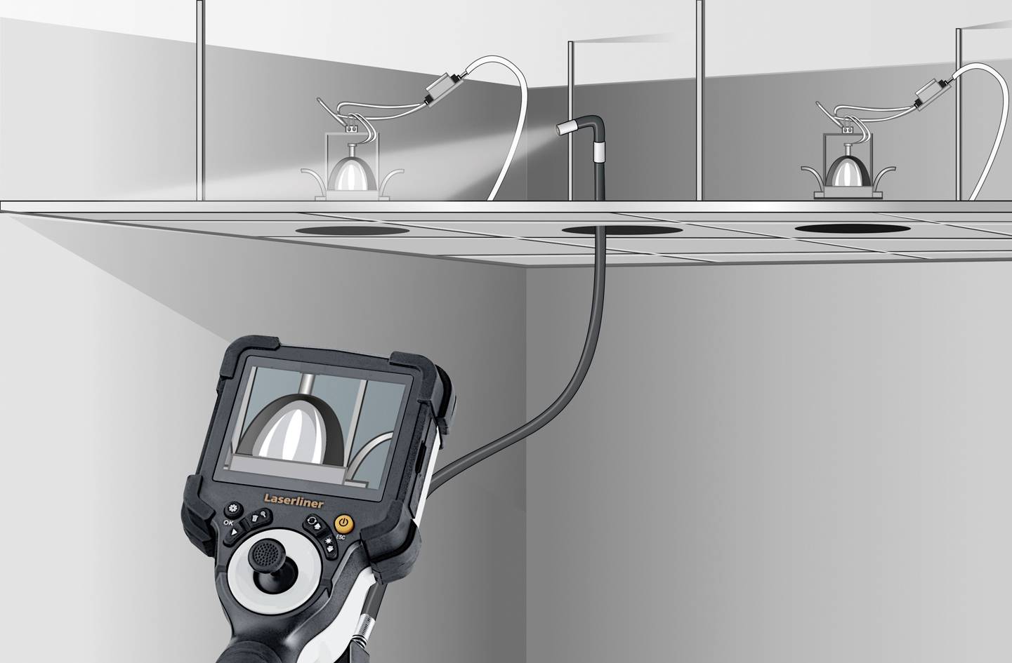 An inspection camera checks pipes above a suspended ceiling. An image of the interior of the ceiling is visible on the screen.