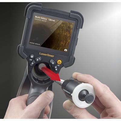 A person is holding an inspection camera with a screen displaying the interior of an object.