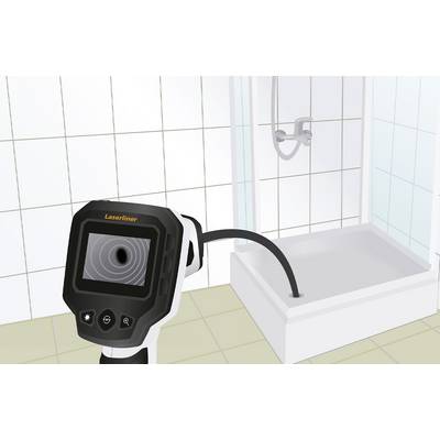 A endoscope camera is being used to inspect a drain in a shower. The camera displays the image of the interior of the pipe.