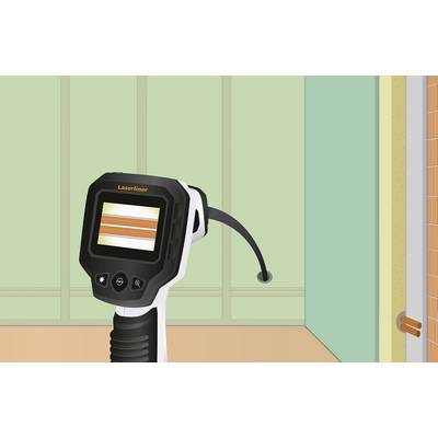 An endoscope inspection device shows orange lines on the screen. It is positioned in front of a turquoise wall with an orange door frame.