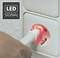 An electrical socket with a light effect indicating that the plug is correctly inserted. Beside it, a symbol reading 'LED SIGNAL'.