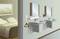 A voltage tester indicates the electrical voltage at a socket in the bathroom, with a warning symbol for electrical hazard on the wall.