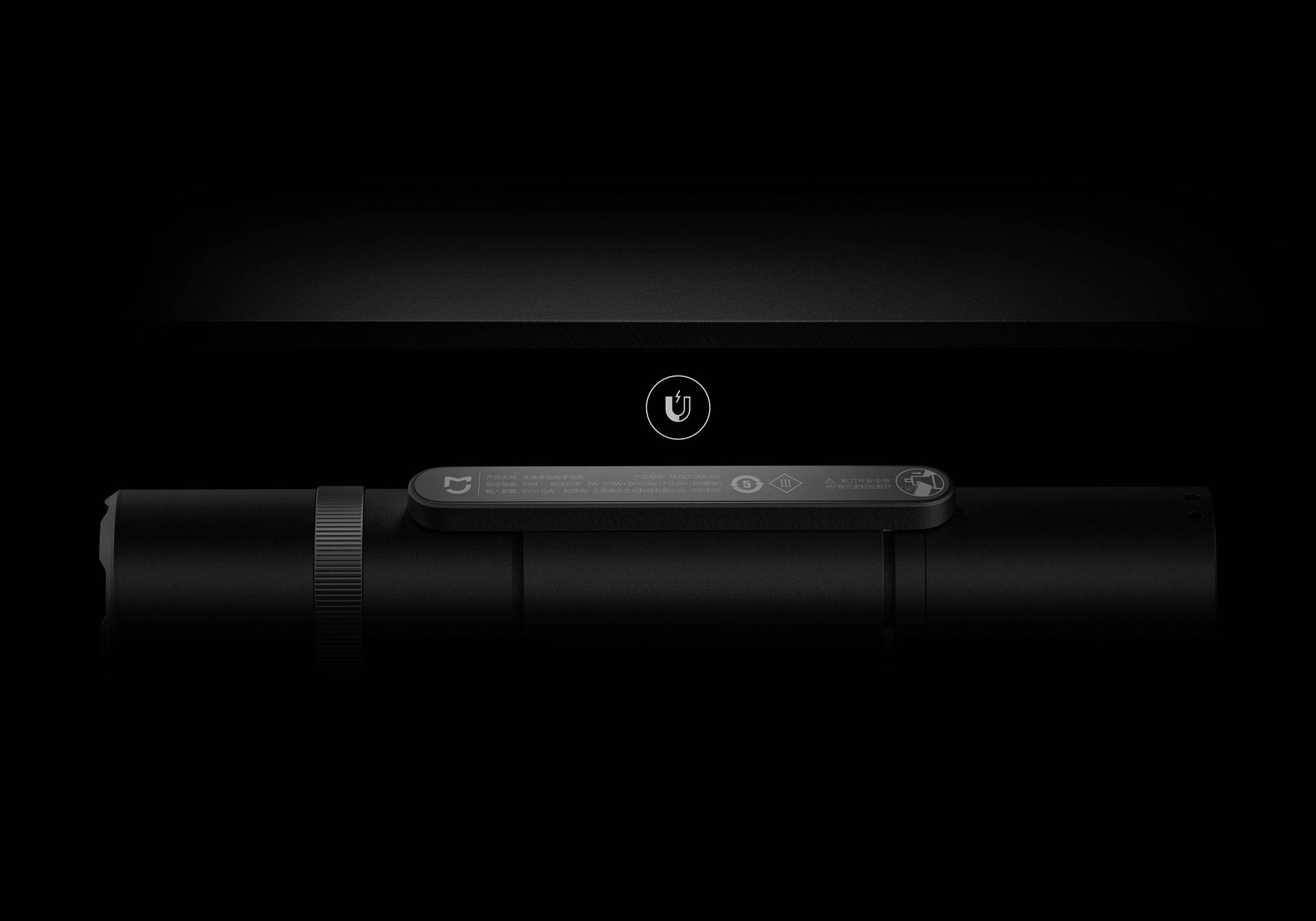 Black torch on a dark background with the power button highlighted in the centre. Minimalist, stylish design.