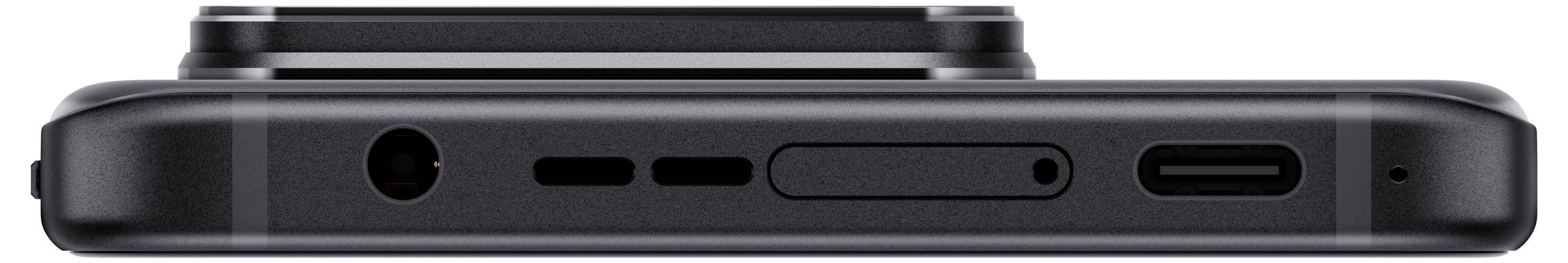 Smartphone side with charging port, speaker, and audio sockets.