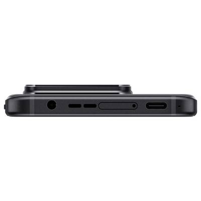 Smartphone side with charging port, speaker, and audio sockets.