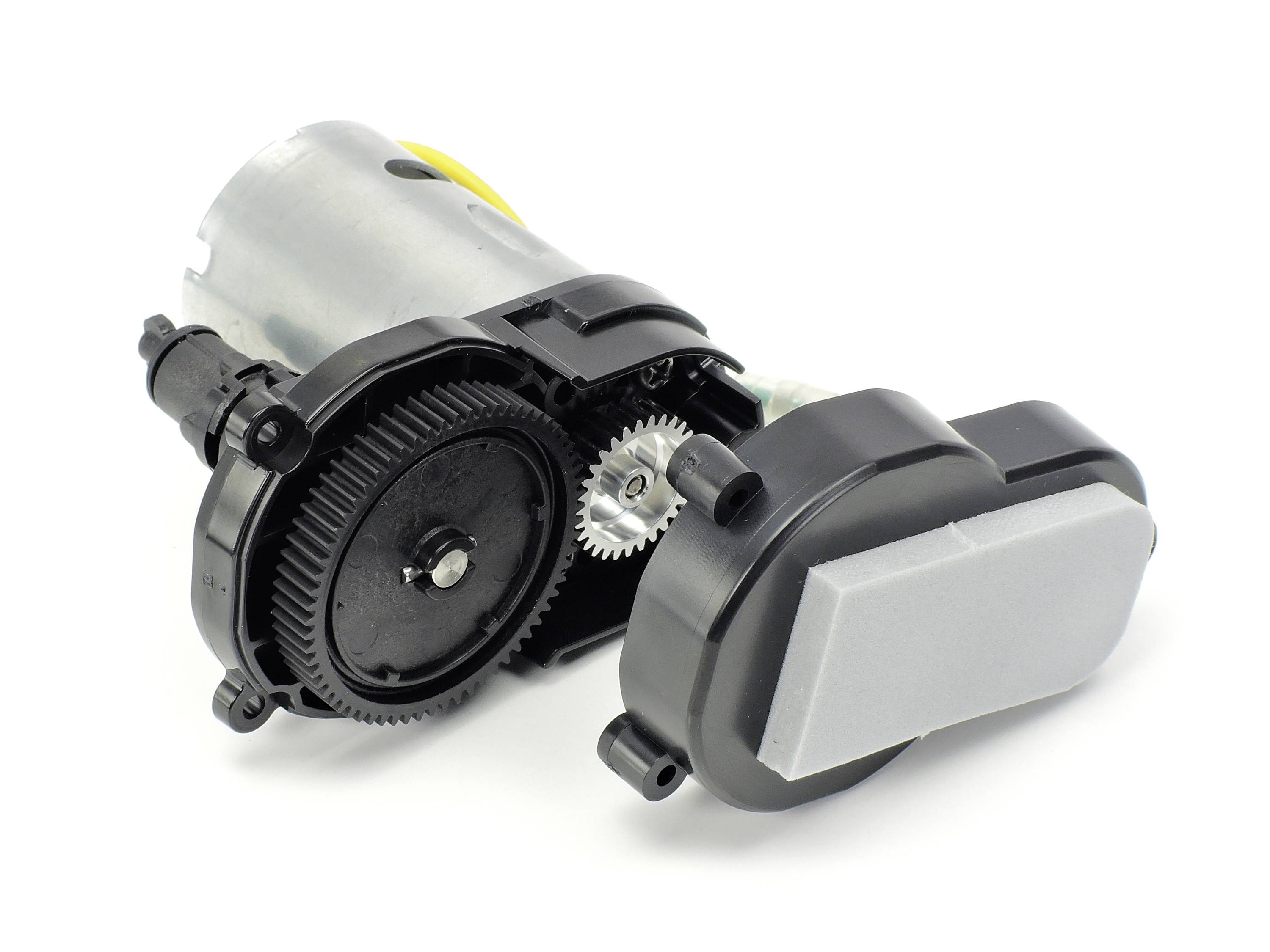'An electric geared motor with visible gears and housing. Main components: motor, gear mechanism and cover.'