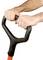 A person is gripping the handle of a hand pump with both hands.