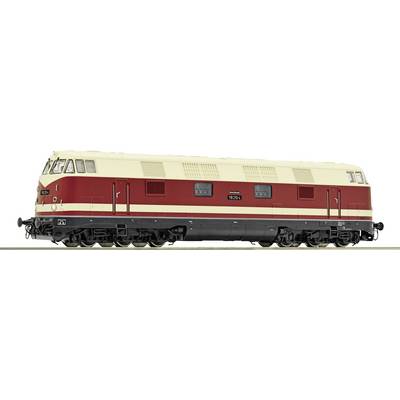 Model Railway: A cream-red diesel locomotive of the V 180 class on a section of track, with detailed windows and doors.