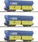 Three identical, coloured goods wagons with blue roofs and yellow sides, labelled 'PKP Cargo', arranged on railway tracks.