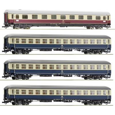 Four model railway passenger carriages in varied designs and colours, each with detailing and labelling.