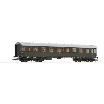 A model of a historical green railway carriage with a brown roof, illuminated windows, and detailed undercarriages.
