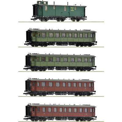 Five railway carriages in different designs and colours: a luggage van (green), two green passenger carriages and two red passenger carriages. All presented on a single track.