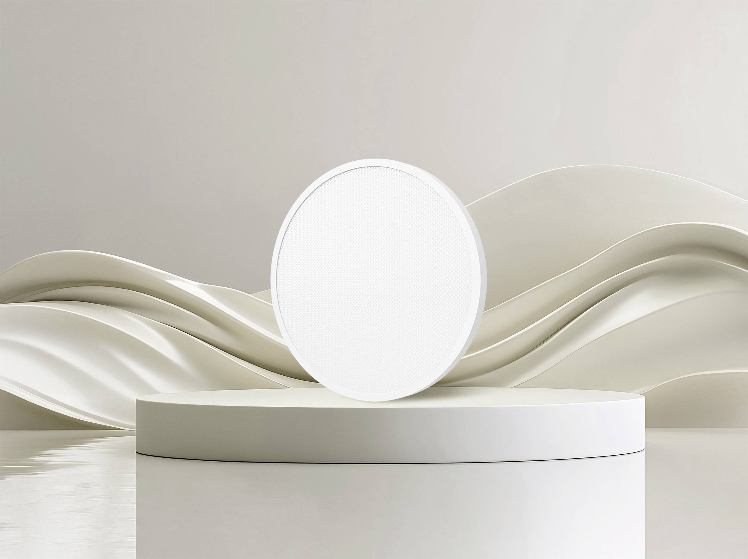 Round, white speaker on a white, circular pedestal with a wave-patterned cream-coloured background.