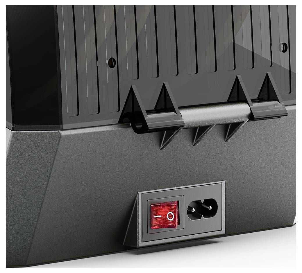 Black power switch and socket connection on the back of an electronic device, possibly a monitor or television.