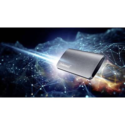 External hard drive by 'Intenso' hovers in a futuristic, digital network environment with glowing lines and points in the background.