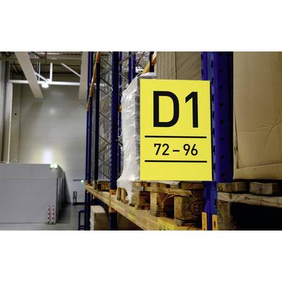 Yellow sign with the inscription 'D1 72-96' is hanging on a shelf in a warehouse. Pallets are stacked underneath.