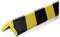 Black and yellow diagonally striped plastic corner guard for preventing impacts on corners and edges in industrial environments.