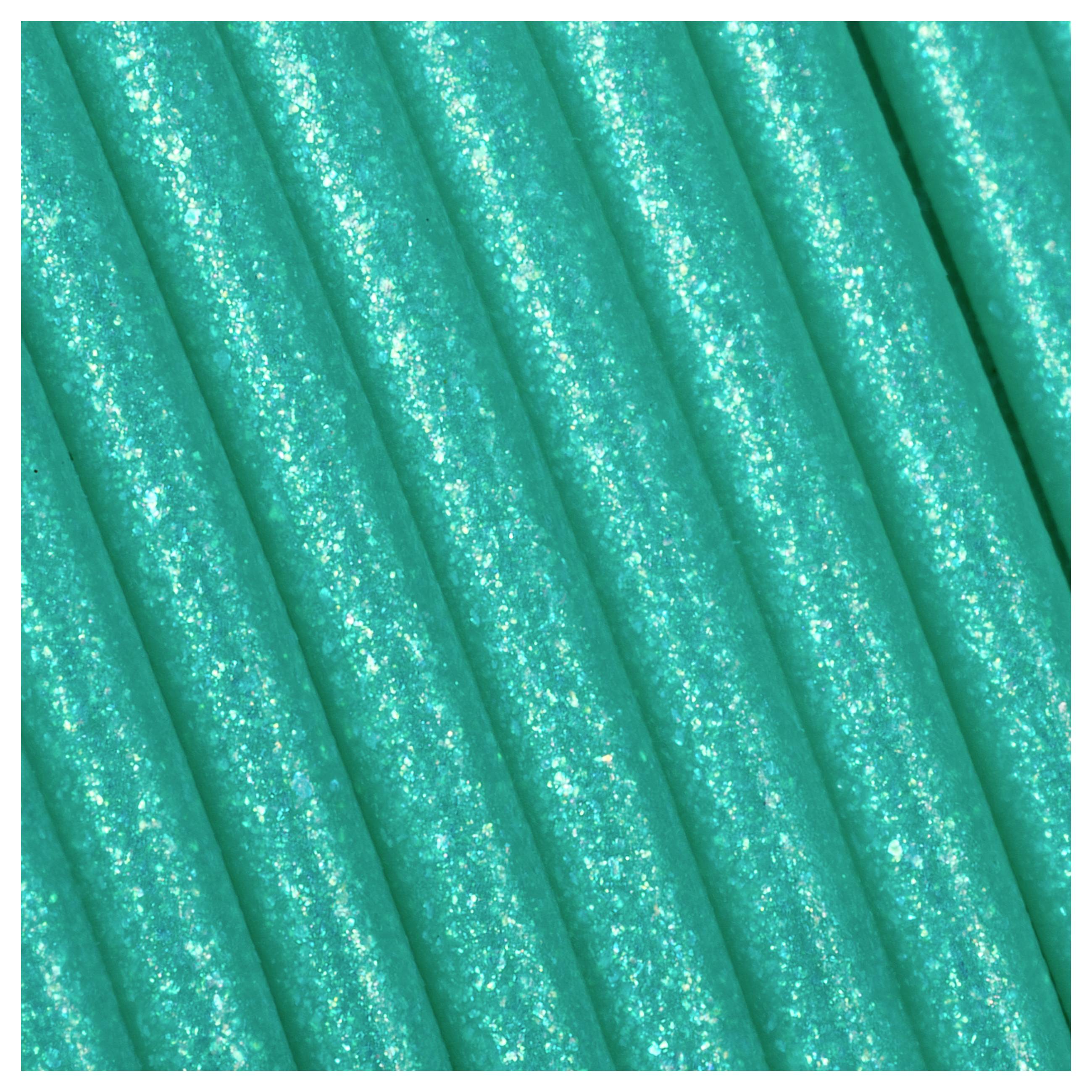 Turquoise, glittering tubes or rods in a close-up, lying diagonally on top of each other. Reflecting light when viewed at an angle.