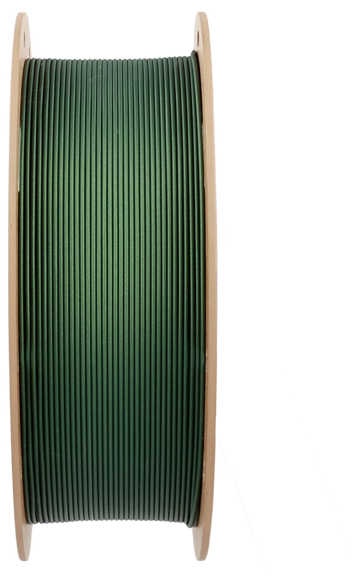 Green filament roll for 3D printer on spool in side view.