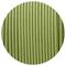 Close-up of a circular image of ordered, vertical, green lines on a textured surface.