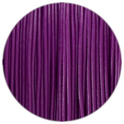 Purple plastic wires in a circular pattern closely arranged next to each other.