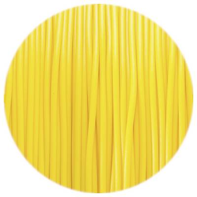 A close-up of yellow, upright spaghetti in a circular cutout.