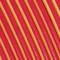 Close-up of yellow-red noodles running parallel to each other, forming a striped pattern.