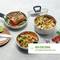 Three pots with various dishes: roast beef, colourful pasta and vegetables. Side dish of tomatoes and lime. Note on 18/8 stainless steel and heat distribution.