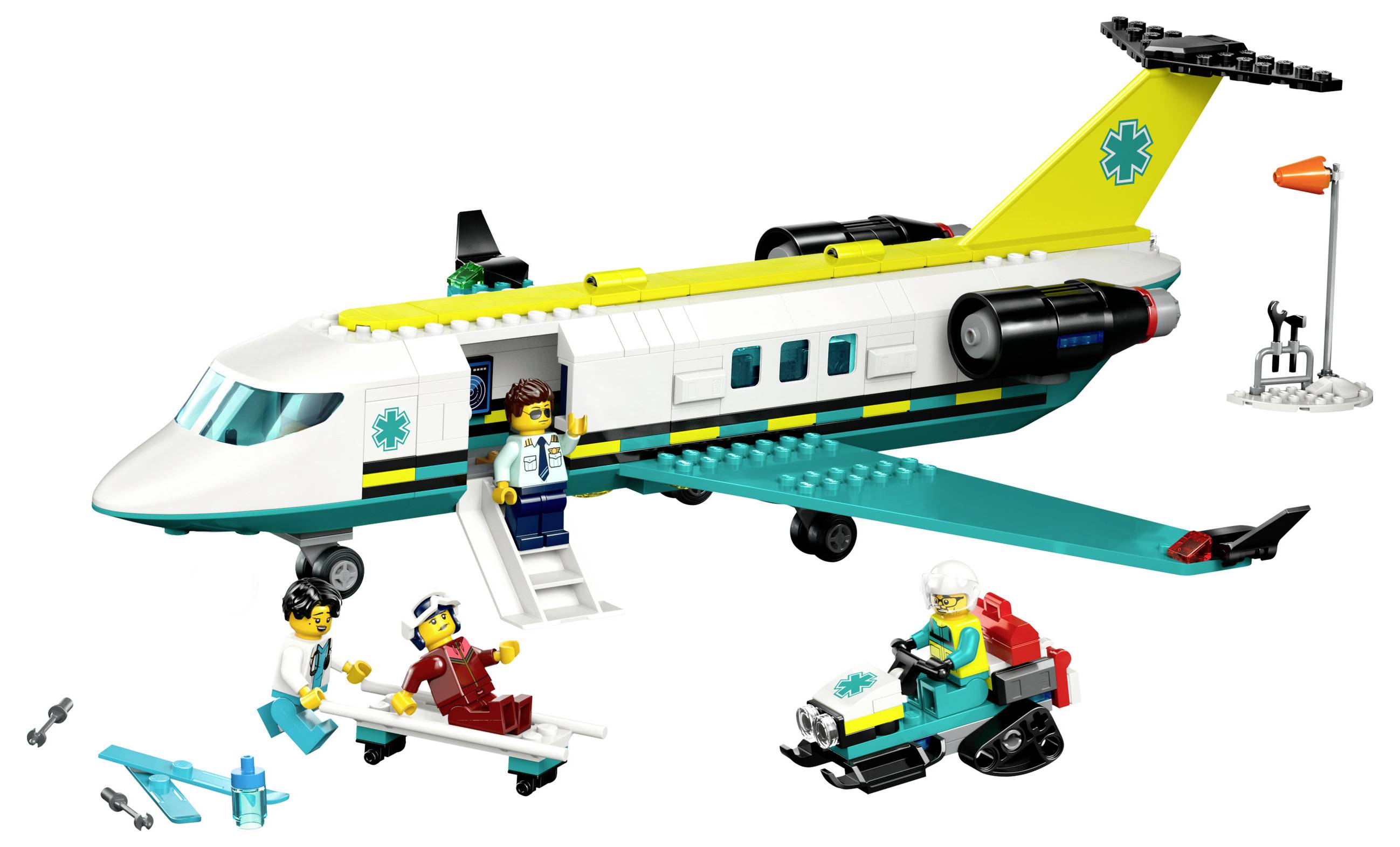 A Lego medical helicopter with medical symbol, open doors and figures. Two people are transporting a figure on a stretcher.
