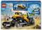 LEGO construction toy building model: Large yellow bulldozer at a construction site. Two construction worker figures stand beside it.