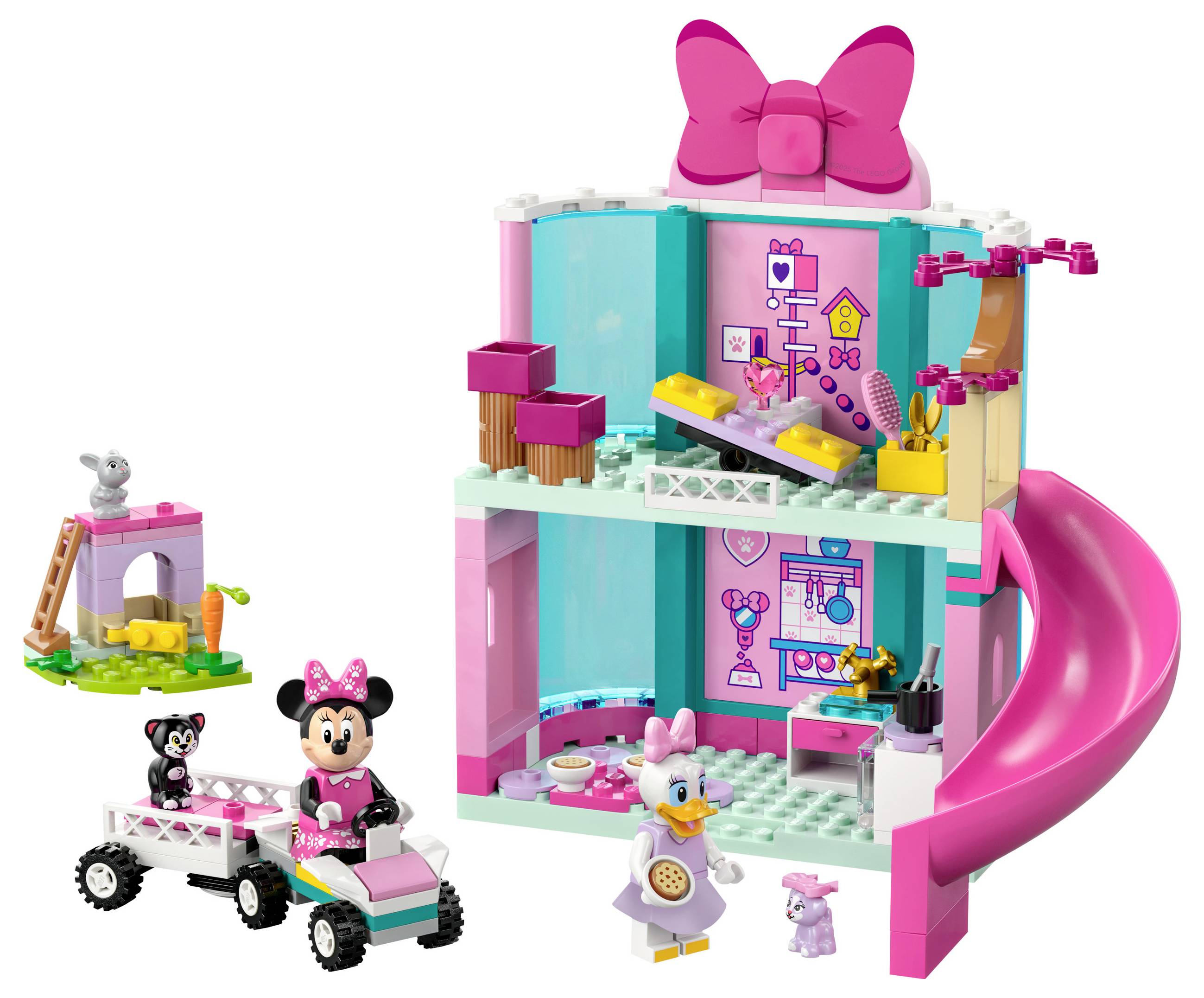 Lego set with Minnie Mouse and Daisy Duck figures in a pink and turquoise house with slide and small play scenes.
