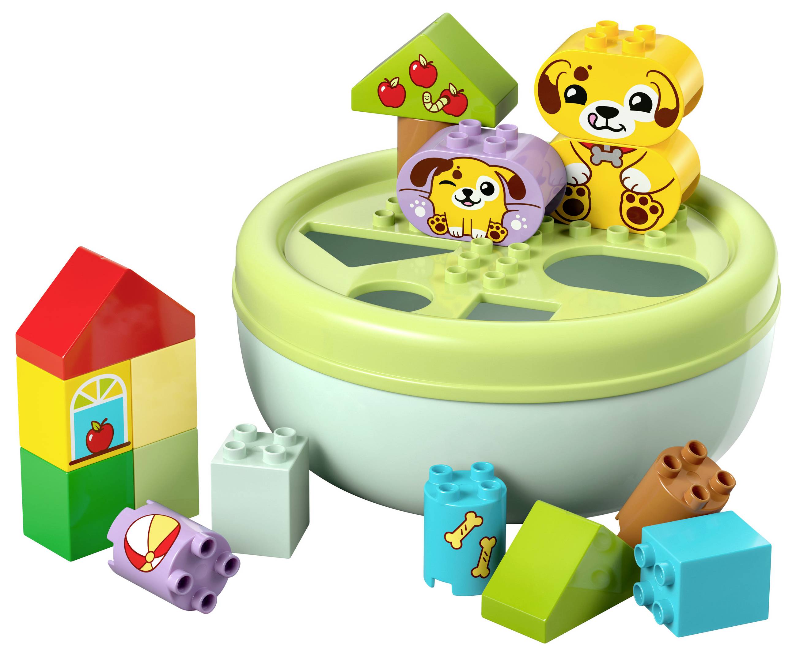 Play set with colorful blocks, some animal motifs and a bowl-shaped sorting toy. Suitable for children.