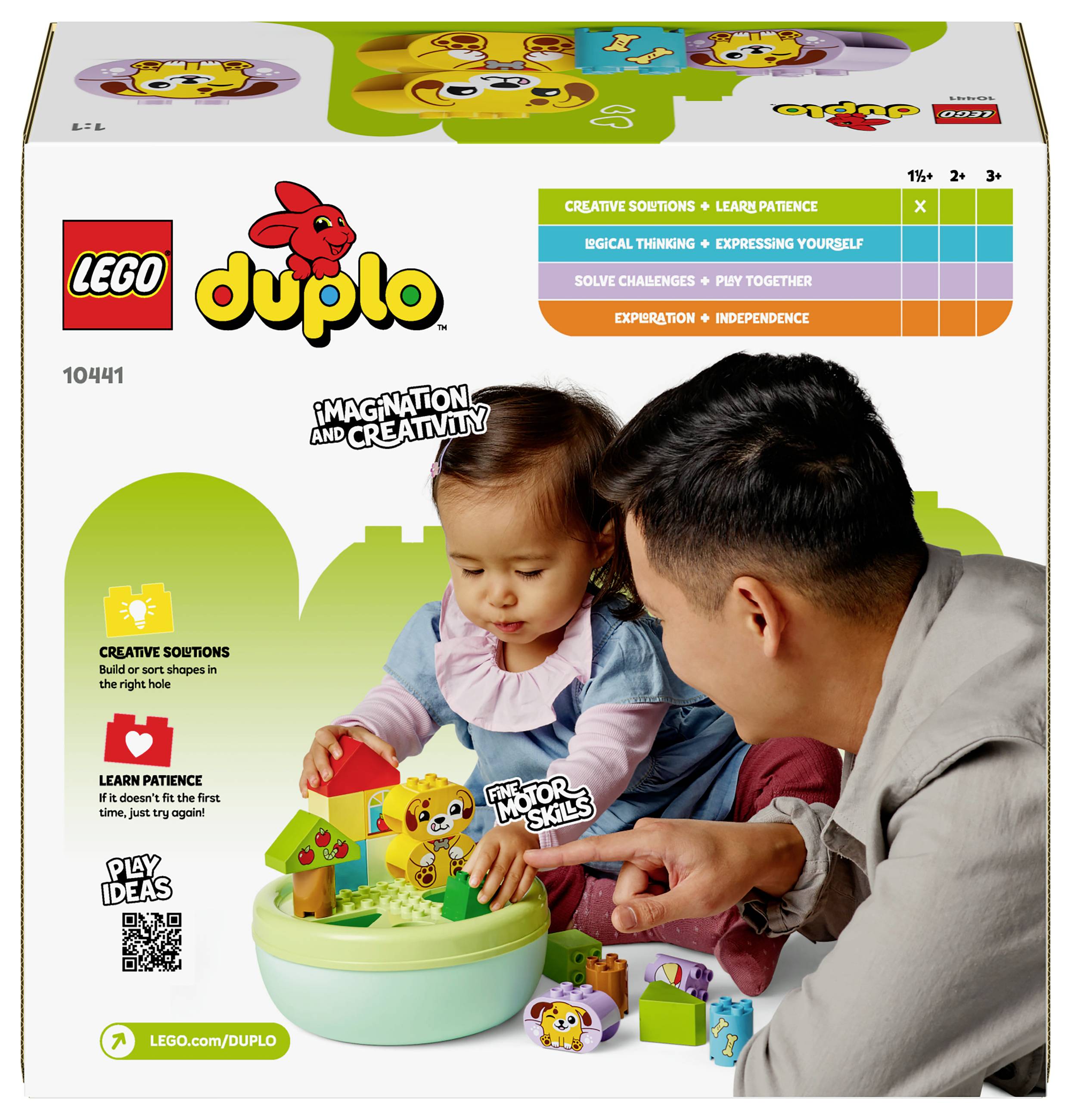 An adult and a child are playing with a LEGO Duplo set on packaging. Colorful building blocks promote motor skills and creativity.