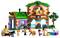Lego set shows a colorful horse farm house with multiple figures, horses and accessories for horse care and farm life.