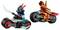 Two LEGO figures on motorcycles: One wears red armor with a yellow sword, the other a gray mask with a green weapon.