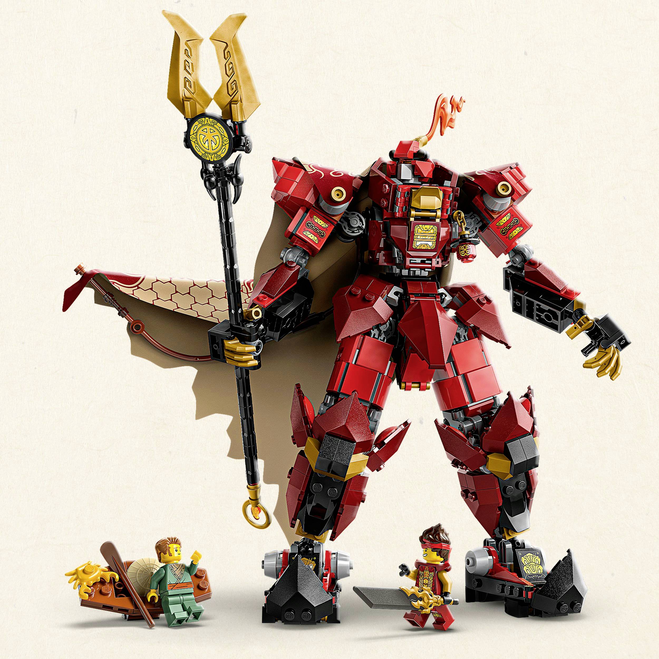 Red Lego mech with large wings holds a staff. A small green Lego character and a red-haired Lego pilot stand beside it.