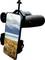 A telescope with a mount that holds a smartphone. The smartphone displays a landscape image featuring mountains, a lake, and meadows.