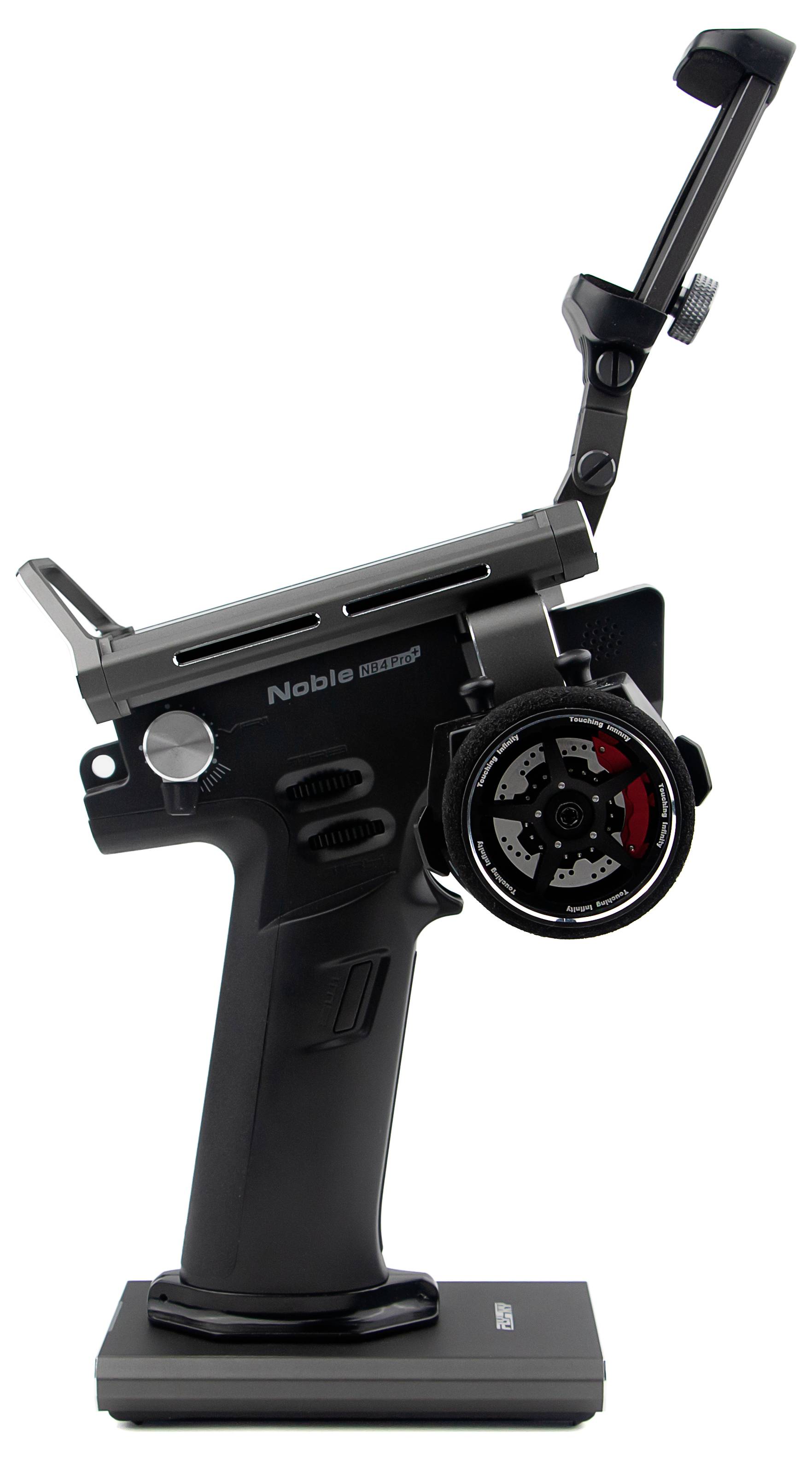 Radio remote control with standard and rotational control, black casing, viewed from the side. Ideal for model vehicles.