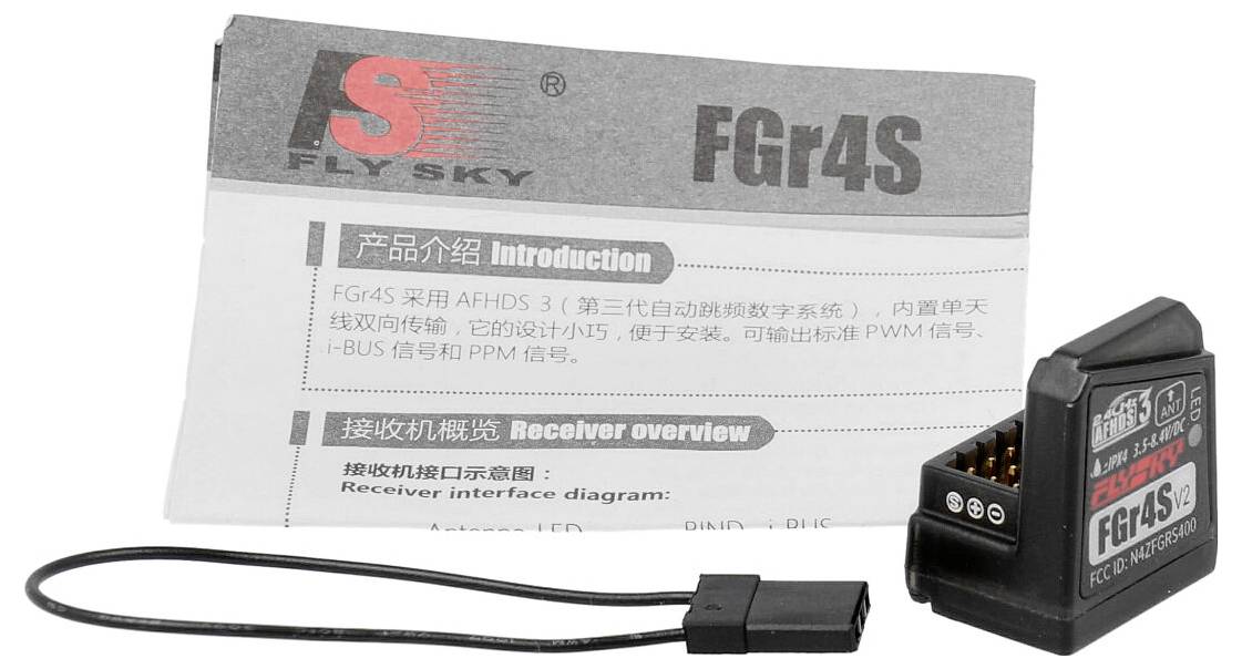 'FlySky FGr4S Receiver' with instruction manual and antenna cable. Manual includes product overview and connection guidance.