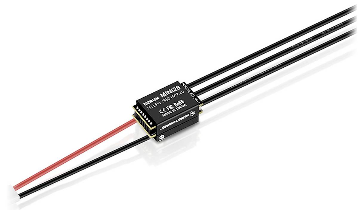 A small electronic component with several connected cables, labelled 'MINI 2D8', is lying on a reflective surface.