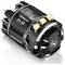 Electric motor 'Hobbywing XeRun 21.5T', black casing, gold-coloured terminals on top, suitable for model-making and remote-controlled cars.